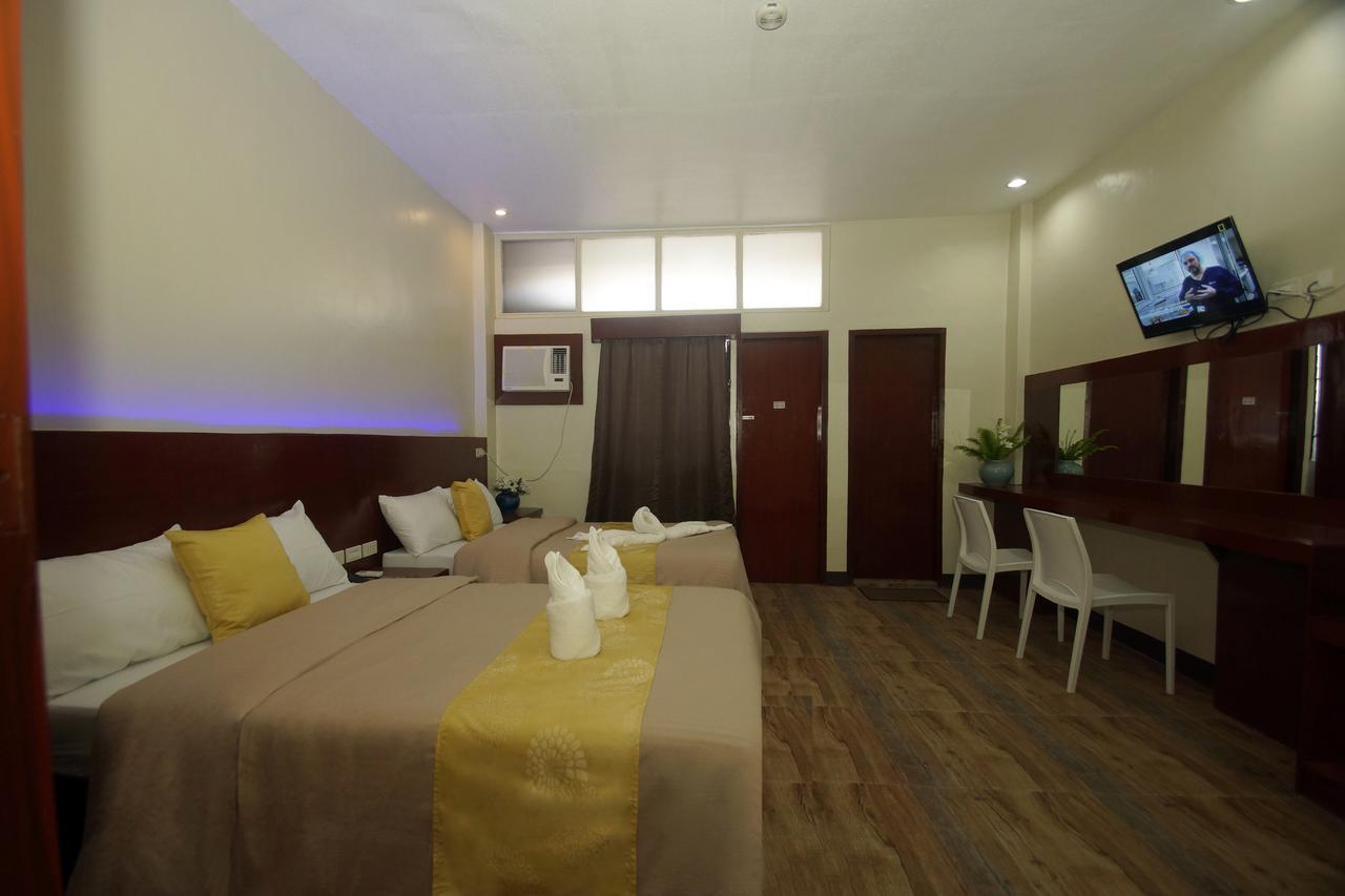 Hacasi Hotel Anibong Bagian luar foto