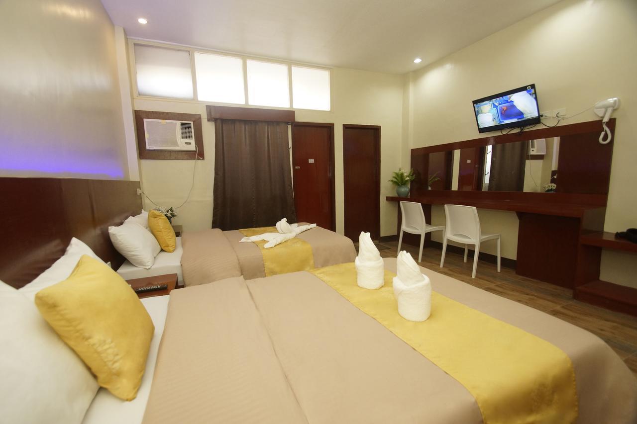 Hacasi Hotel Anibong Bagian luar foto