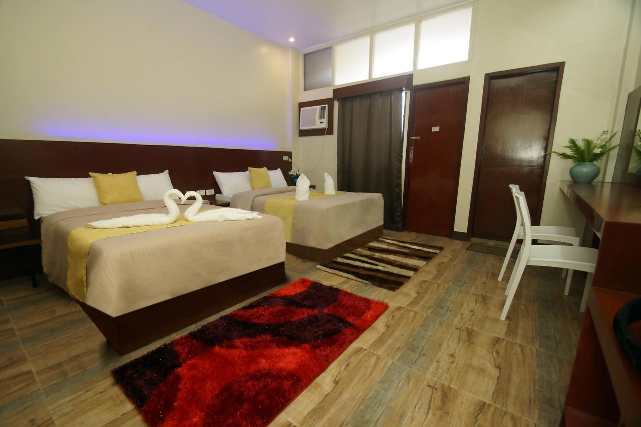 Hacasi Hotel Anibong Bagian luar foto