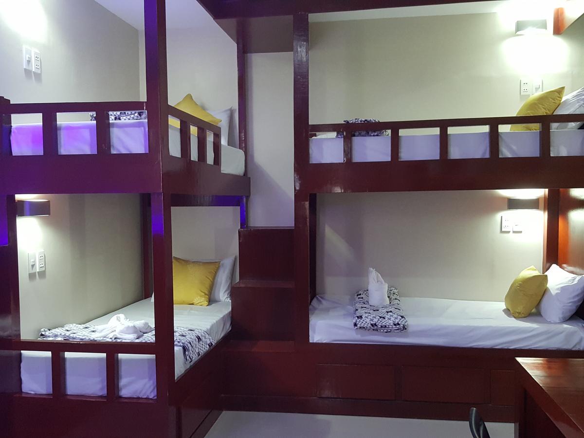 Hacasi Hotel Anibong Bagian luar foto