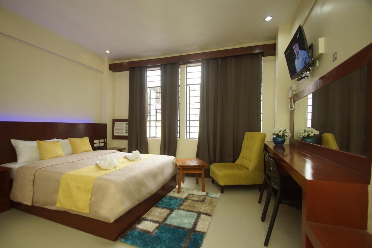 Hacasi Hotel Anibong Bagian luar foto